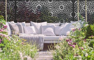 decorative screens used to zone a south facing garden