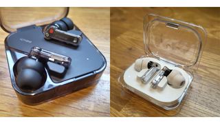 Nothing Ear review; black ear buds on a wooden table