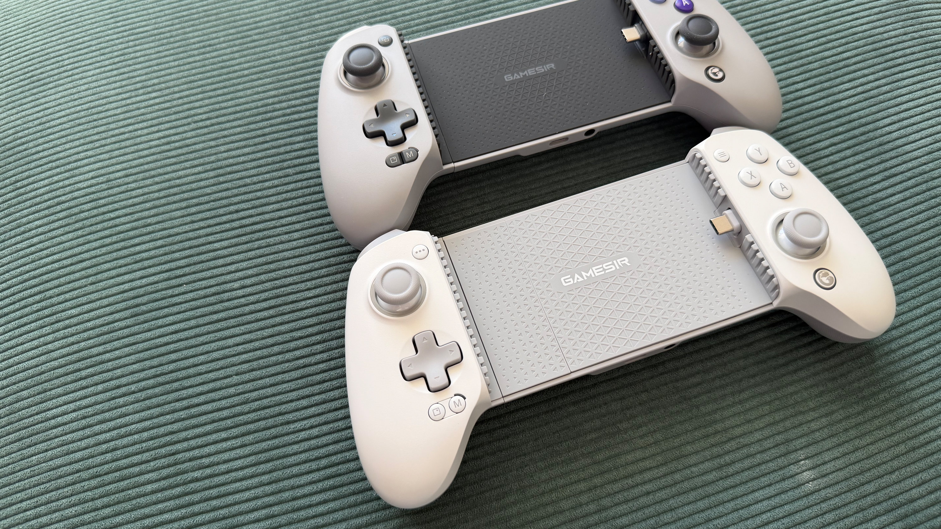 The GameSir G8+ MFi mobile controller on a green surface