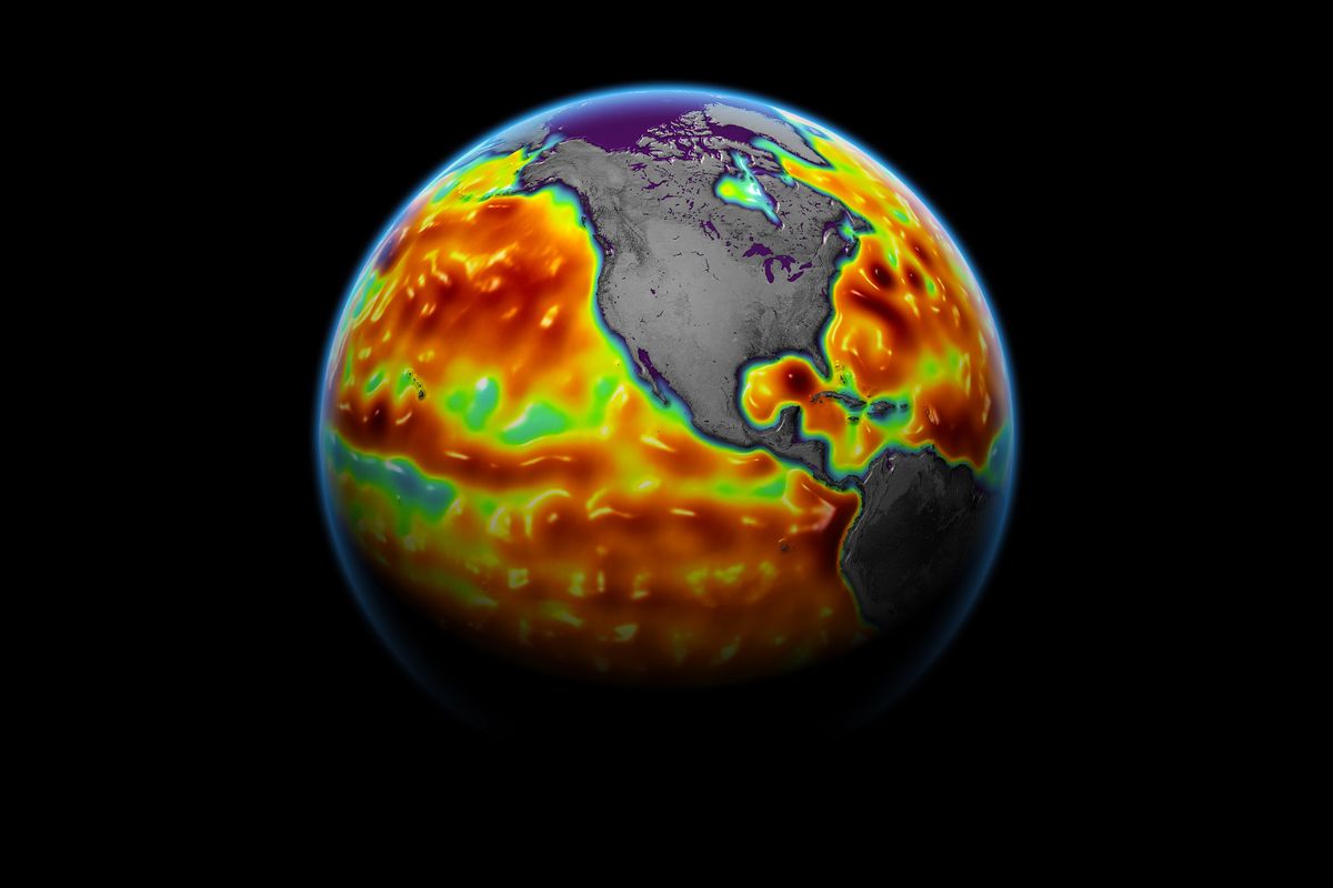 A map showing sea surface height anomalies in June 2021, with ares in red and orange representing sea levels 10 to 15 cm higher than normal.