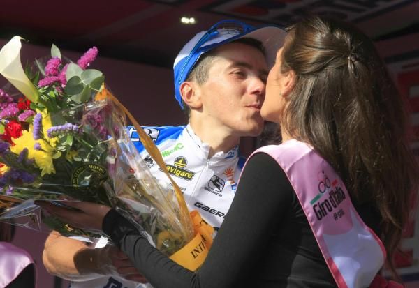 Domenico Pozzovivo (Colnago-CSF Inox) receives the kisses and bouquet on the podium.