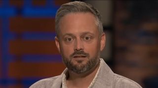 Nate Bargatze as Nate in The Breadwinner. He's in Shark Tank with a shocked look on his face.