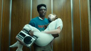 Caleb McLaughlin as Lucas Sinclair and Sadie Sink as Max Mayfield in Stranger Things 5.
