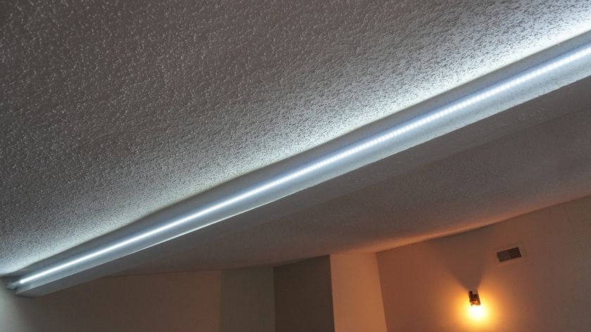 The Govee Strip Light with Skyline Kit mounted behind a beam emanating clean white light