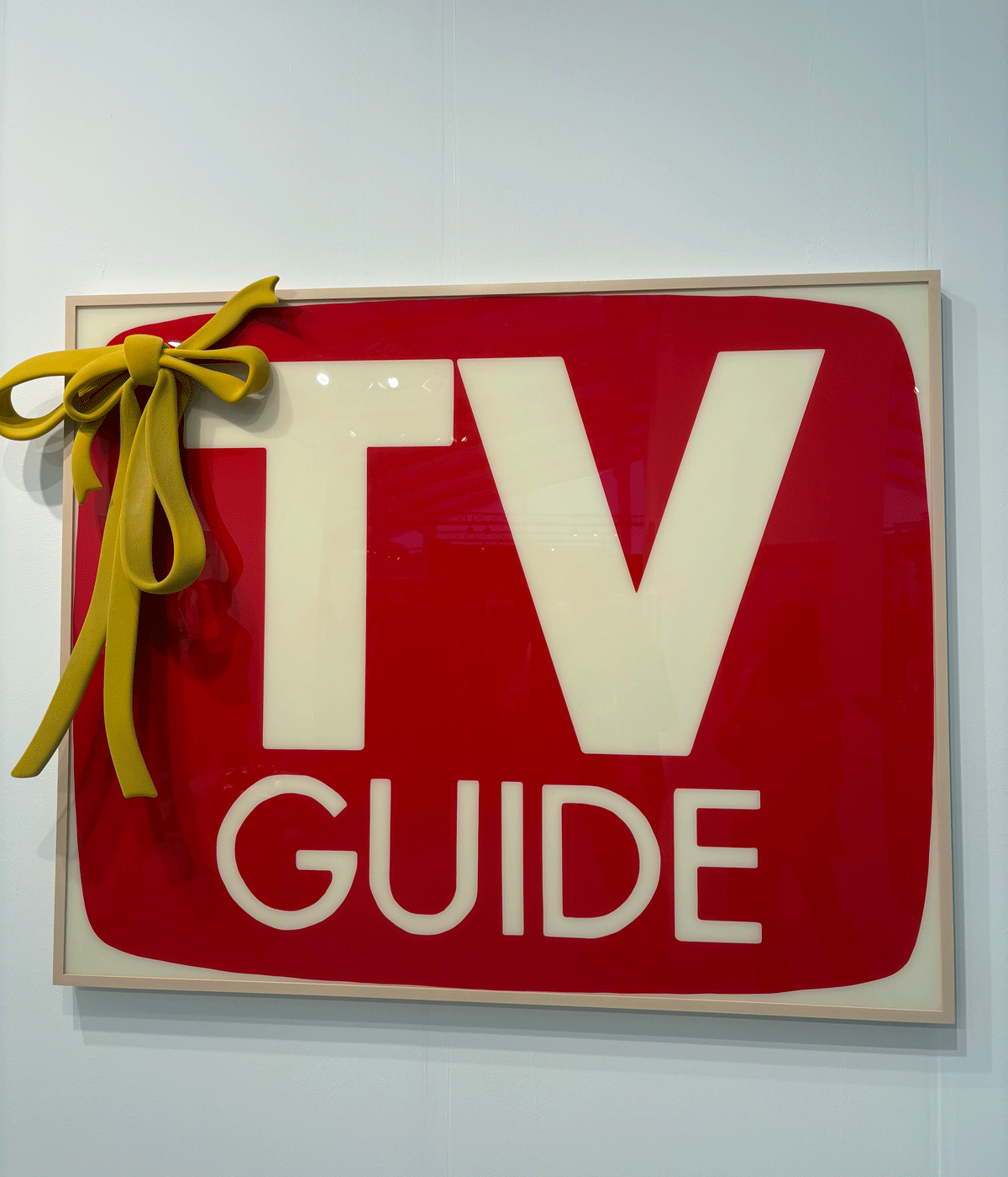 red square saying tv guide