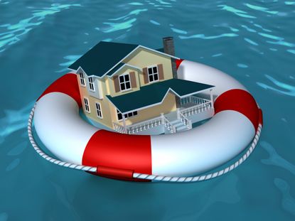 photo illustration a house floating on a life preserver
