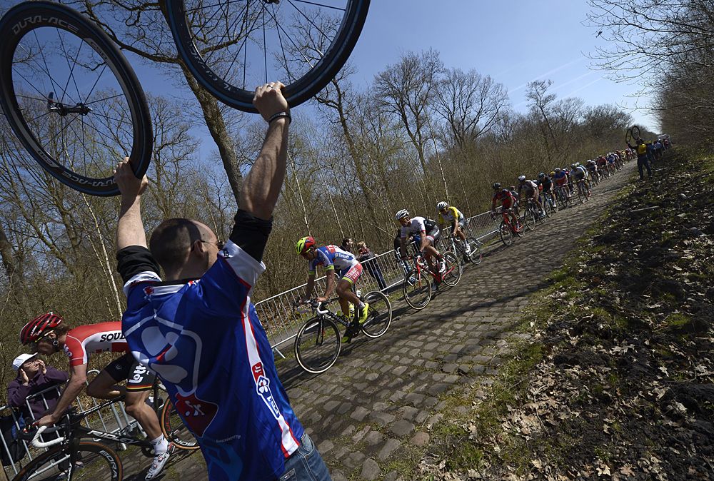 FDJ ready to offer wheel support as Tinkoff-Saxo's Peter Sagan rides by in the field