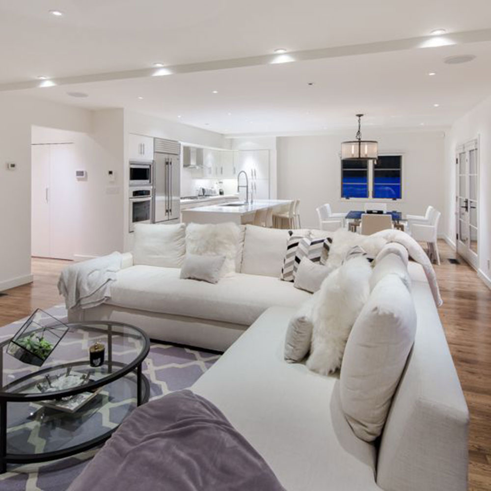 living room with white wall and white couch