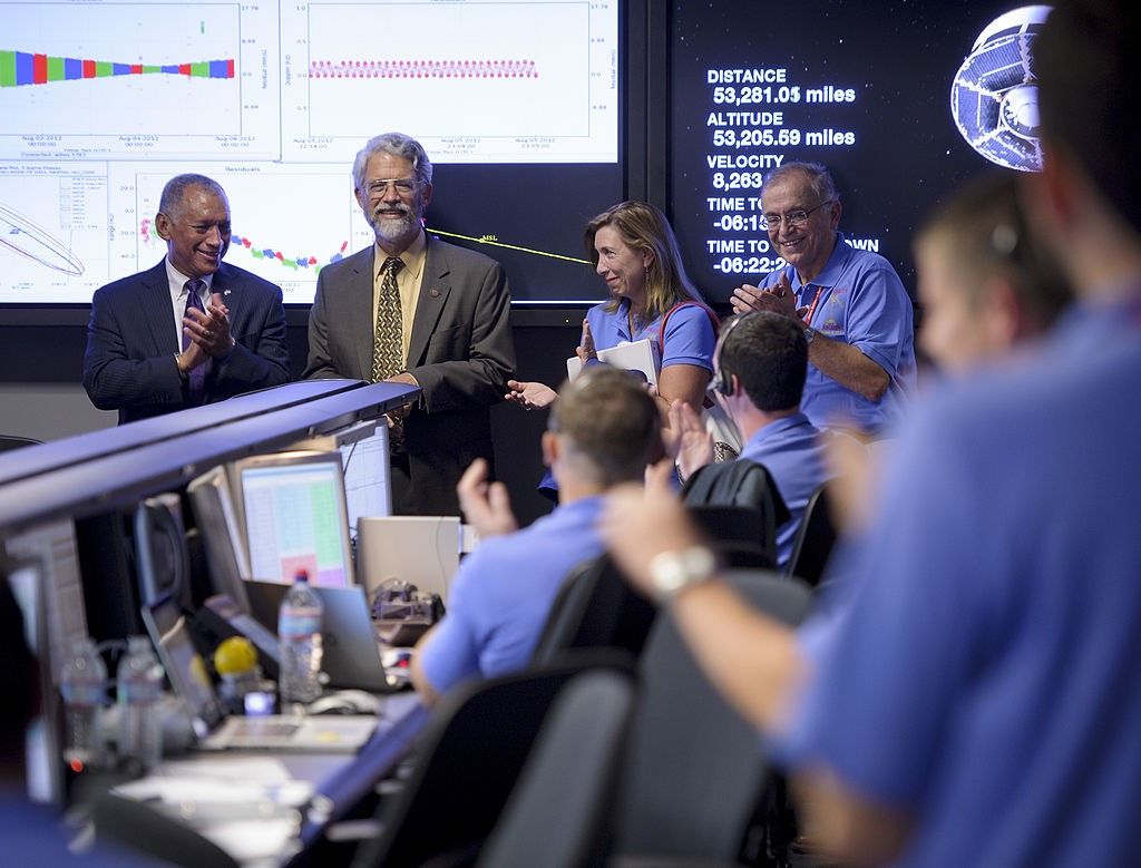 White House Science and Technology Advisor John Holdren (second from left) stops by the Mars Science Laboratory Mission Support Area on Aug. 5, 2012, at the Jet Propulsion Laboratory in Pasadena, California.