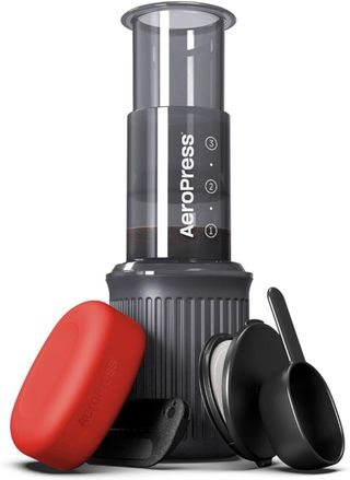 An AeroPress Go travel coffee maker on a white background