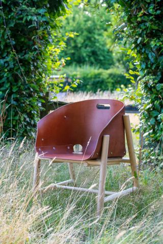 Leather chair by Bill Amberg photographed among nature at the Knepp Estate in Sussex