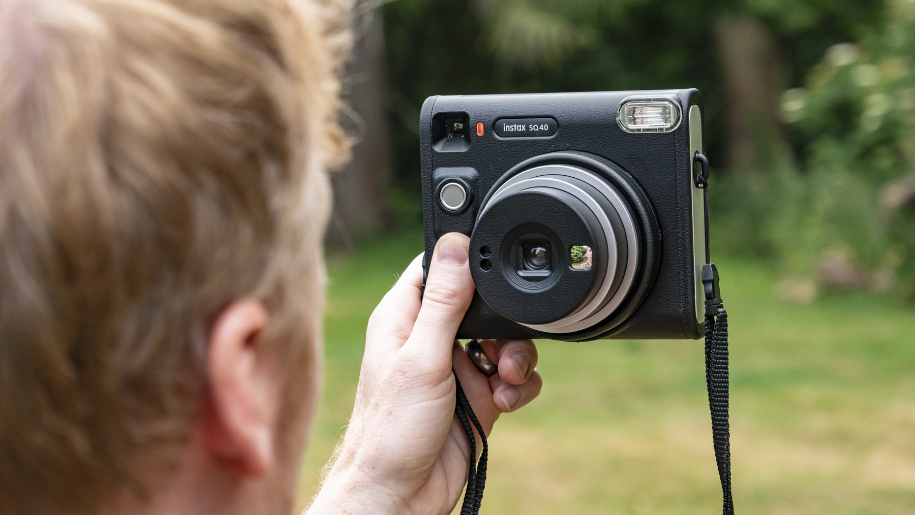 Fujifilm Instax SQ40 camera taking a selife