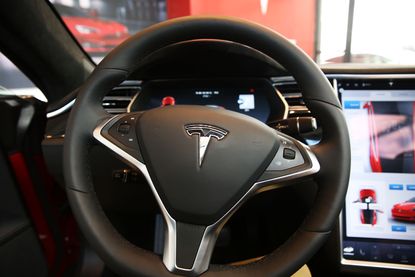 The steering wheel of a Tesla car