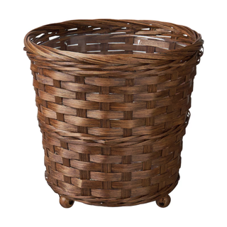 A rattan-inspired woven planter pot