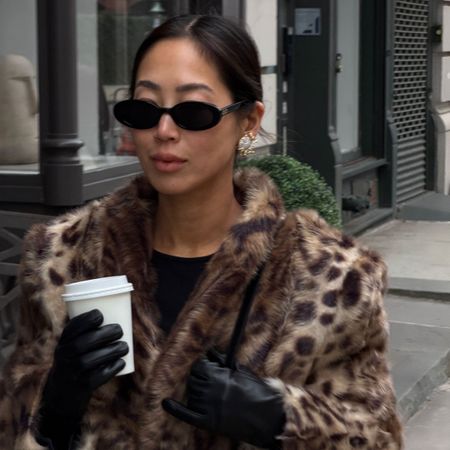 @aimeesong outfit closeup in leopard coat with black leather gloves