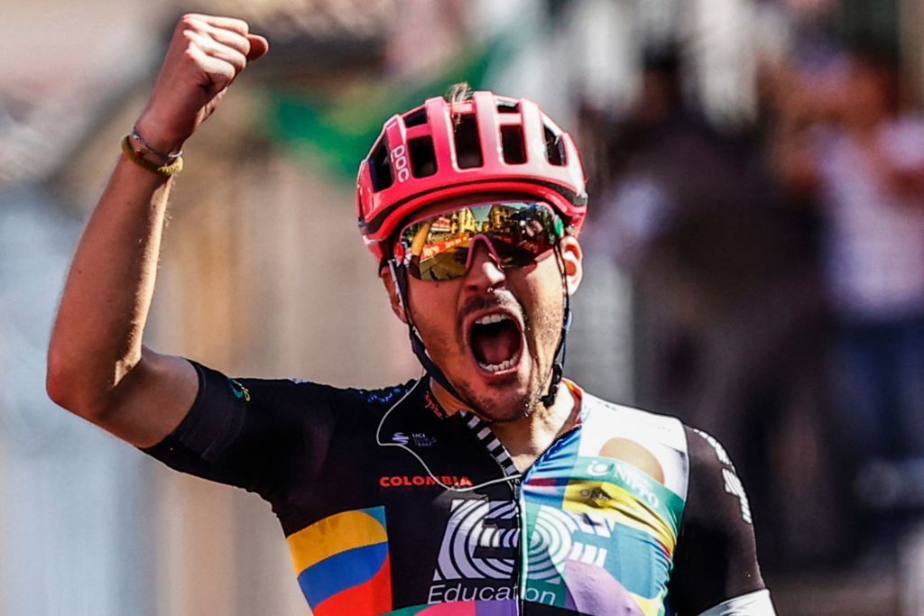 Team EF Education rider Italys Alberto Bettiol celebrates as he crosses the finish line to win the 18th stage of the Giro dItalia 2021 cycling race 231km between Rovereto and Stradella on May 27 2021 Photo by Luca Bettini AFP Photo by LUCA BETTINIAFP via Getty Images