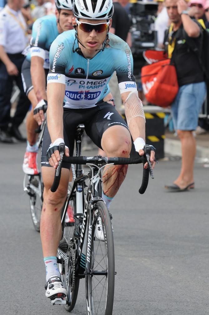 Omega Pharma Quick Step's Tony Martin was the worst injured in the huge crash at 5km, arriving with blood streaming down his leg and multiple other wounds