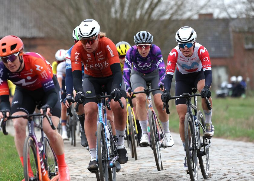 Julie De Wilde of Fenix-Deceuninck (second from left) rides on cobbles for victory at Ixina GP Oetingen 2025