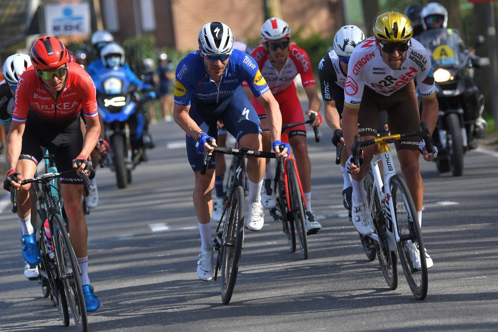WAREGEM BELGIUM MARCH 31 Warren Barguil of France and Team Arka Samsic Florian Senechal of France and Team Deceuninck QuickStep Greg Van Avermaet of Belgium and Team AG2R Citren Team during the 75th Dwars Door Vlaanderen 2021 Mens Elite a 1841km race from Roeselare to Waregem DDV DDV21 FlandersClassic A travers la Flandre on March 31 2021 in Waregem Belgium Photo by Luc ClaessenGetty Images