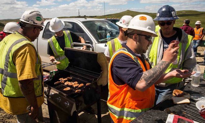 Oil workers eating lunch