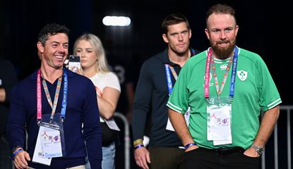 Rory McIlroy and Shane Lowry walk alongside each other