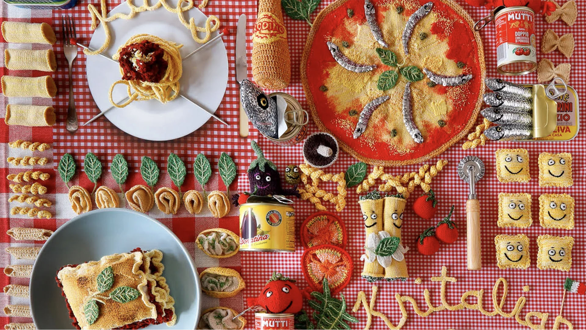 A photo of some knitted food artworks. 