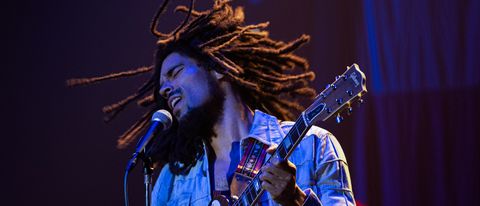 Kingsley Ben-Adir pictured as Bob Marley in concert in Bob Marley: One Love.