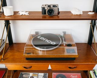 Record player on a wooden stand