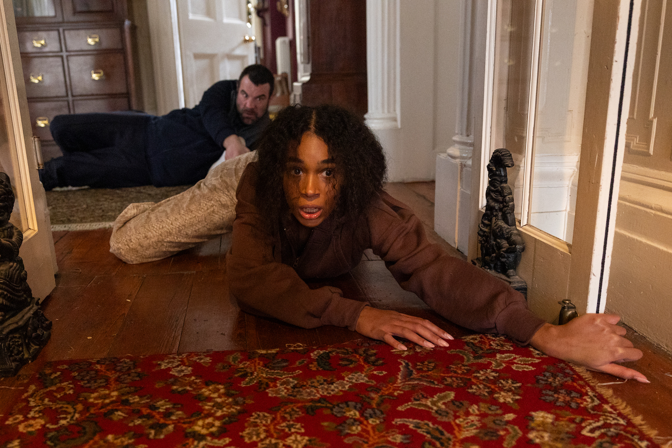 Vicky Grant trying to escape the house.