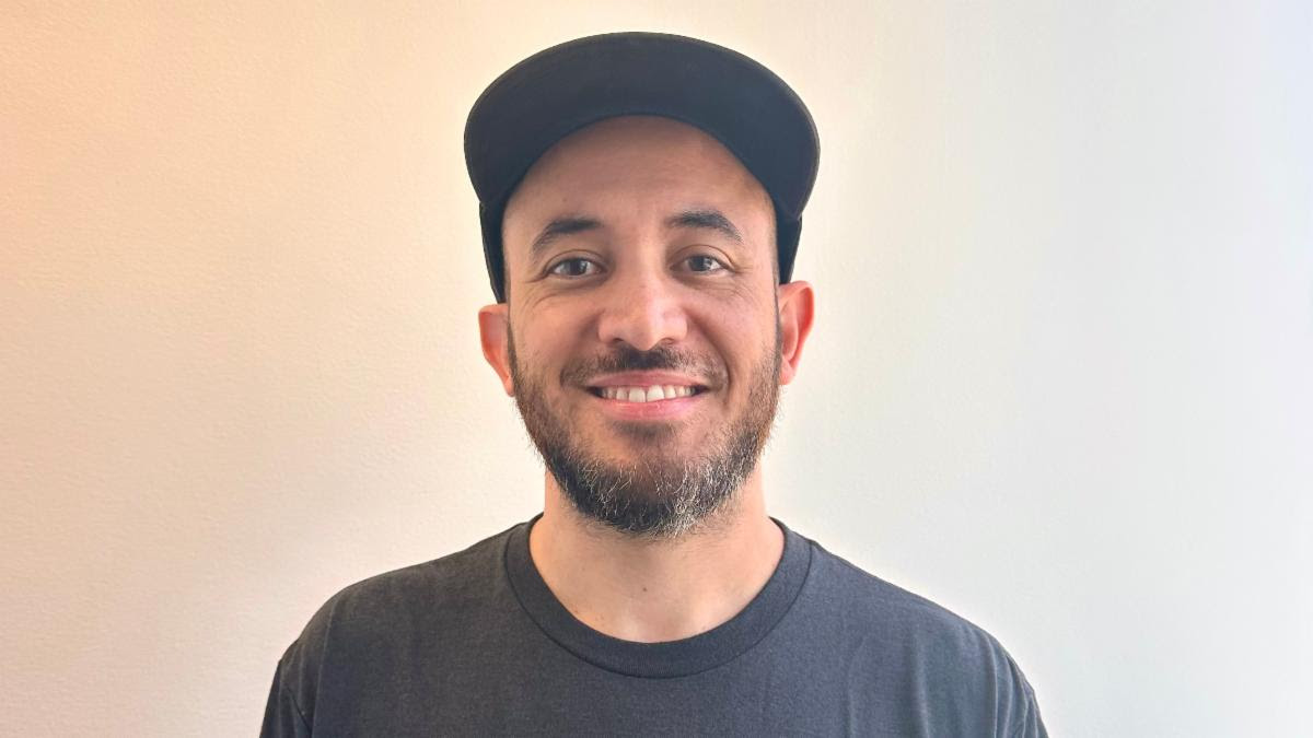 Smiling headshot of Tony Jacques.