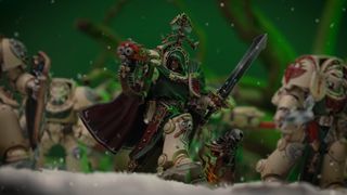 Grand Master Belial aims his bolter in the snow