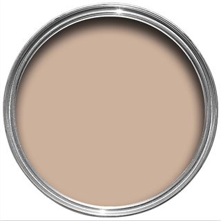 A tin of light pink paint