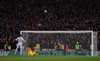 Chelsea goalkeeper Kepa Arrizabalaga blasts a penalty over the crossbar in a penalty shootout against Liverpool in the 2022 League Cup final.