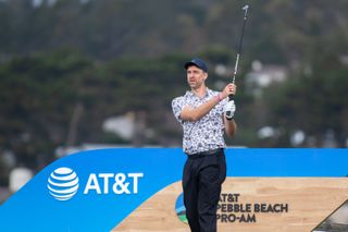 Pau Gasol watches a tee shot at Pebble Beach