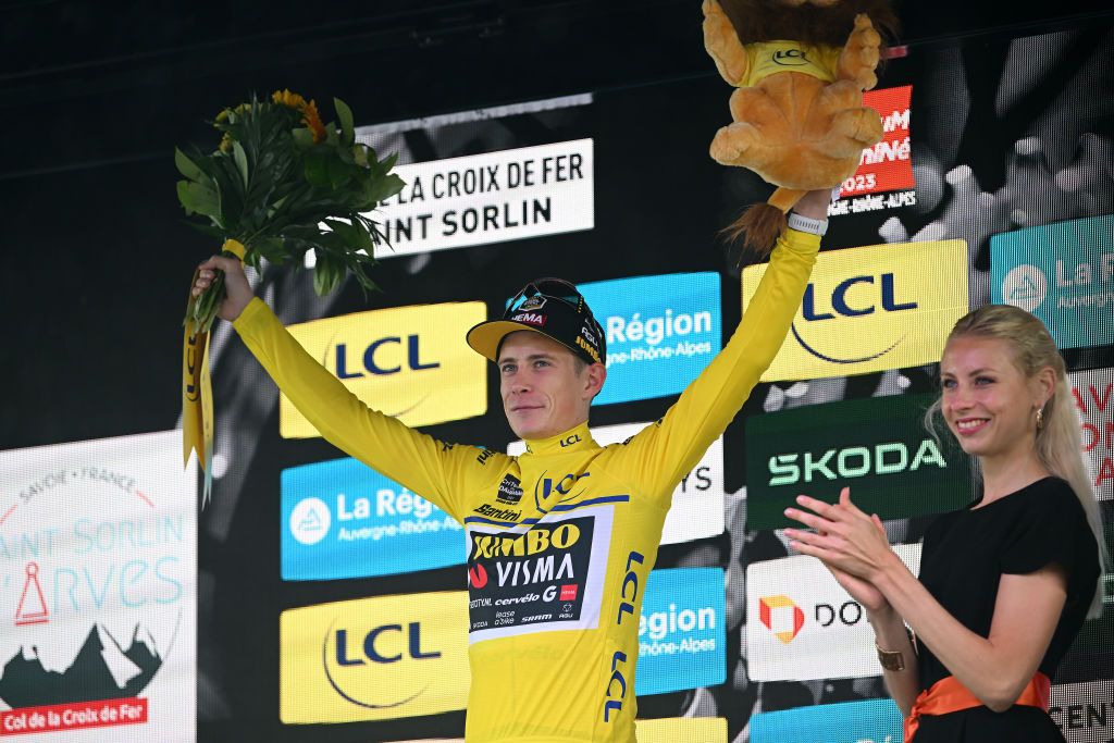 COL DE LA CROIX DE FER FRANCE JUNE 10 Jonas Vingegaard of Denmark and Team JumboVisma Yellow Leader Jersey celebrates at podium during the 75th Criterium du Dauphine 2023 Stage 7 a 1479km stage from PortedeSavoie to Col de la Croix de Fer 2067m UCIWT on June 10 2023 in Col de la Croix de Fer France Photo by Dario BelingheriGetty Images