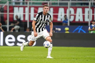 Sven Botman of Newcastle United FC in action during the UEFA Champions League match between AC Milan and Newcastle United FC at Stadio Giuseppe Meazza on September 19, 2023 in Milan, Italy. (Photo by Pier Marco Tacca/Getty Images)