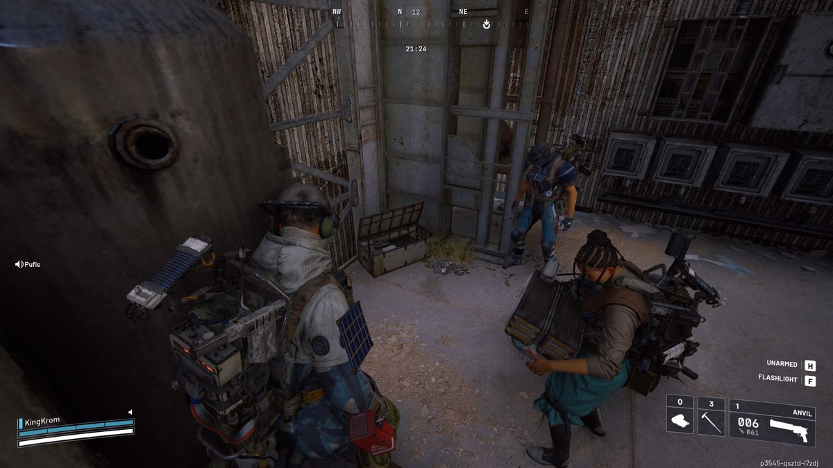 Arc Raiders Worth Your Salt: A player looking at an open box in the corner of a room, with two other players stood nearby.