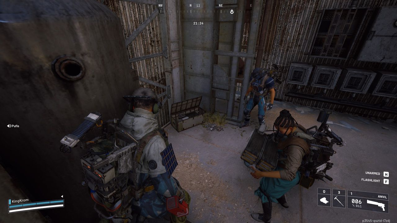 Arc Raiders Worth Your Salt: A player looking at an open box in the corner of a room, with two other players stood nearby.
