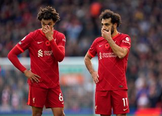 Liverpool’s Trent Alexander-Arnold (left) and Mohamed Salah (right) during the Premier League match at Anfield, Liverpool. Picture date: Saturday October 30, 2021