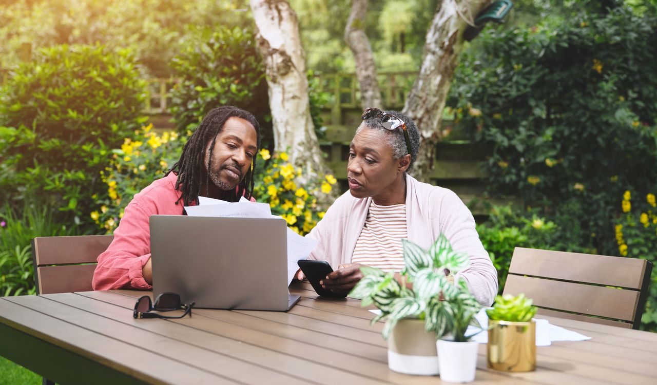 Older couple looking at laptop