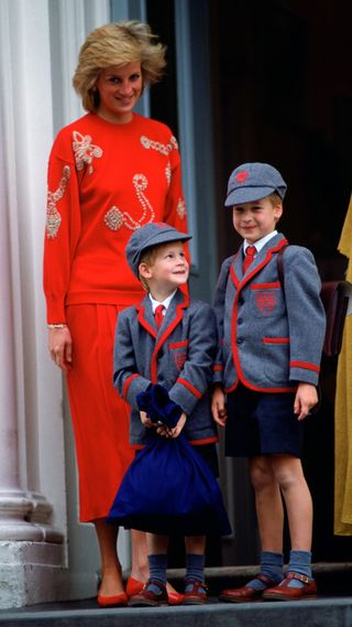 Princess Diana with a young Prince Harry and Prince William in their school uniforms