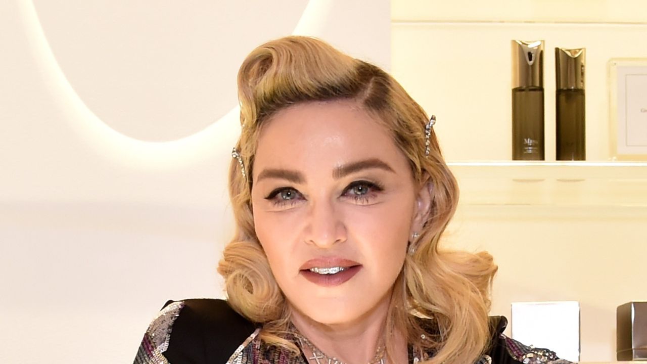 Madonna&#039;s son David sent a powerful message on fashion and gender with his recent outfit choice BEVERLY HILLS, CA - MARCH 06: Madonna visits MDNA SKIN Counter at Barneys New York, Beverly Hills on March 6, 2018 in Beverly Hills, California. (Photo by Kevin Mazur/Getty Images for Madonna&#039;s MDNA SKIN)