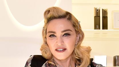 Madonna's son David sent a powerful message on fashion and gender with his recent outfit choice BEVERLY HILLS, CA - MARCH 06: Madonna visits MDNA SKIN Counter at Barneys New York, Beverly Hills on March 6, 2018 in Beverly Hills, California. (Photo by Kevin Mazur/Getty Images for Madonna's MDNA SKIN)
