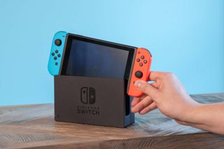 how to charge Nintendo Switch controllers — charge in dock