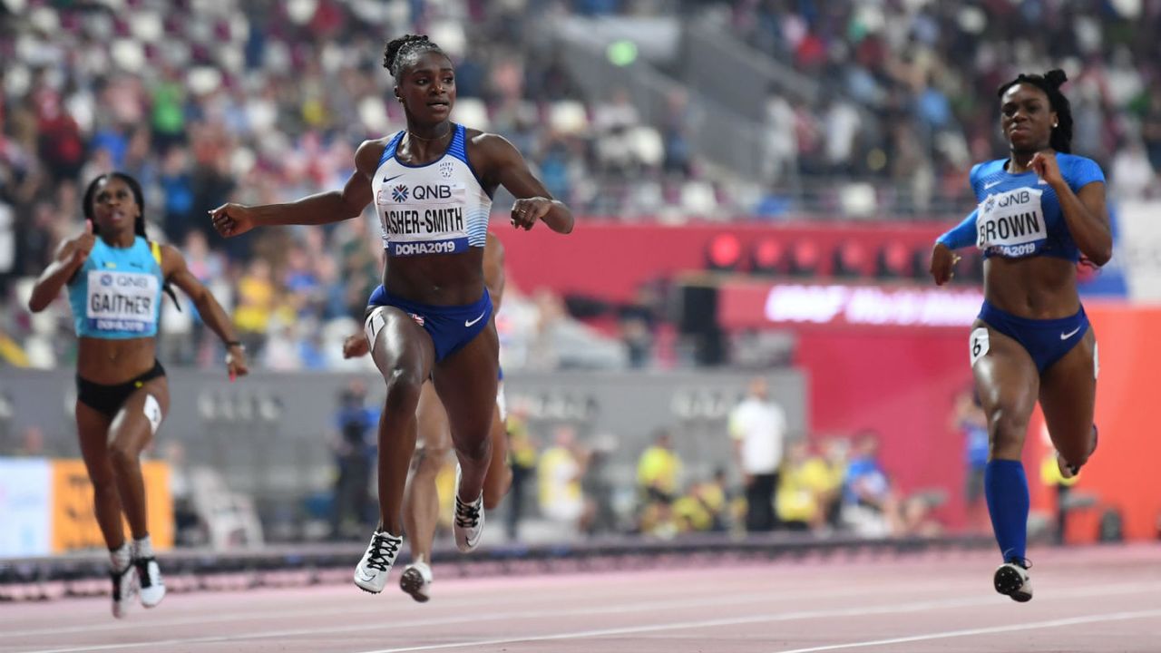 Britain’s Dina Asher-Smith crosses the finish line to win the women’s 200m final in Doha 