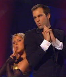 Greg Rusedski performed next, in a James Bond-themed routine