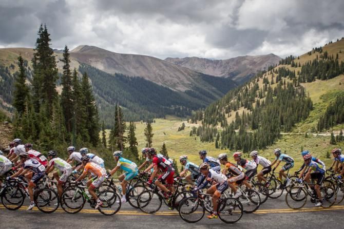 The peloton slowly climbs above 11,000 feet at the USA Pro Challenge in Colorado.