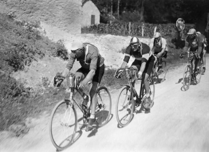 Luxembourg's Nicolas Frantz, wearing the yellow jersey as leader of the Tour de France, rides in front of Frenchman Andre Leducq on July 2, 1927, during the 12th stage between Luchon and Perpignan. Frantz went on to win his first Tour de France as Leducq finished 4th overall.