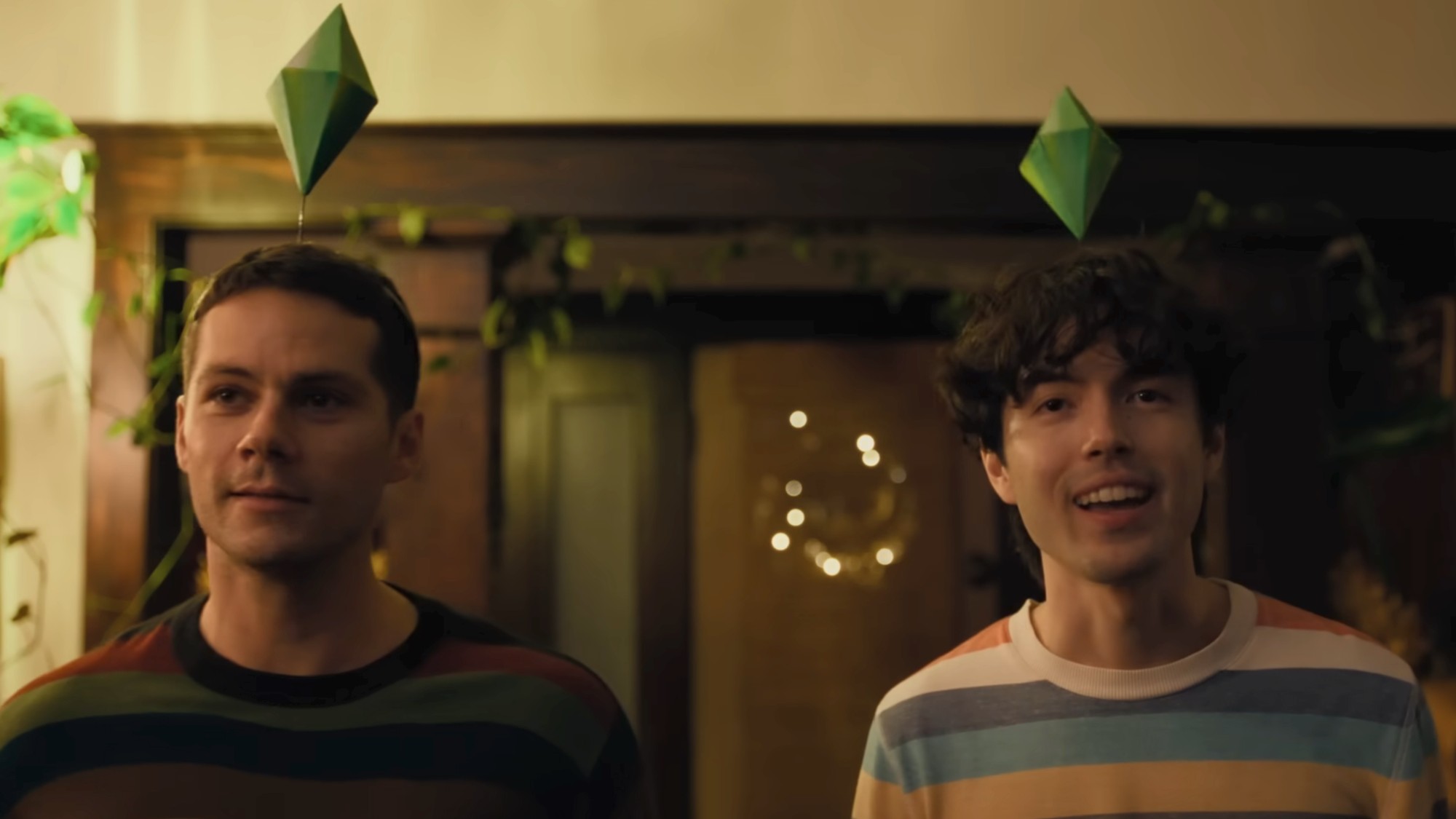 Two characters in Twinless with green diamonds above their heads.