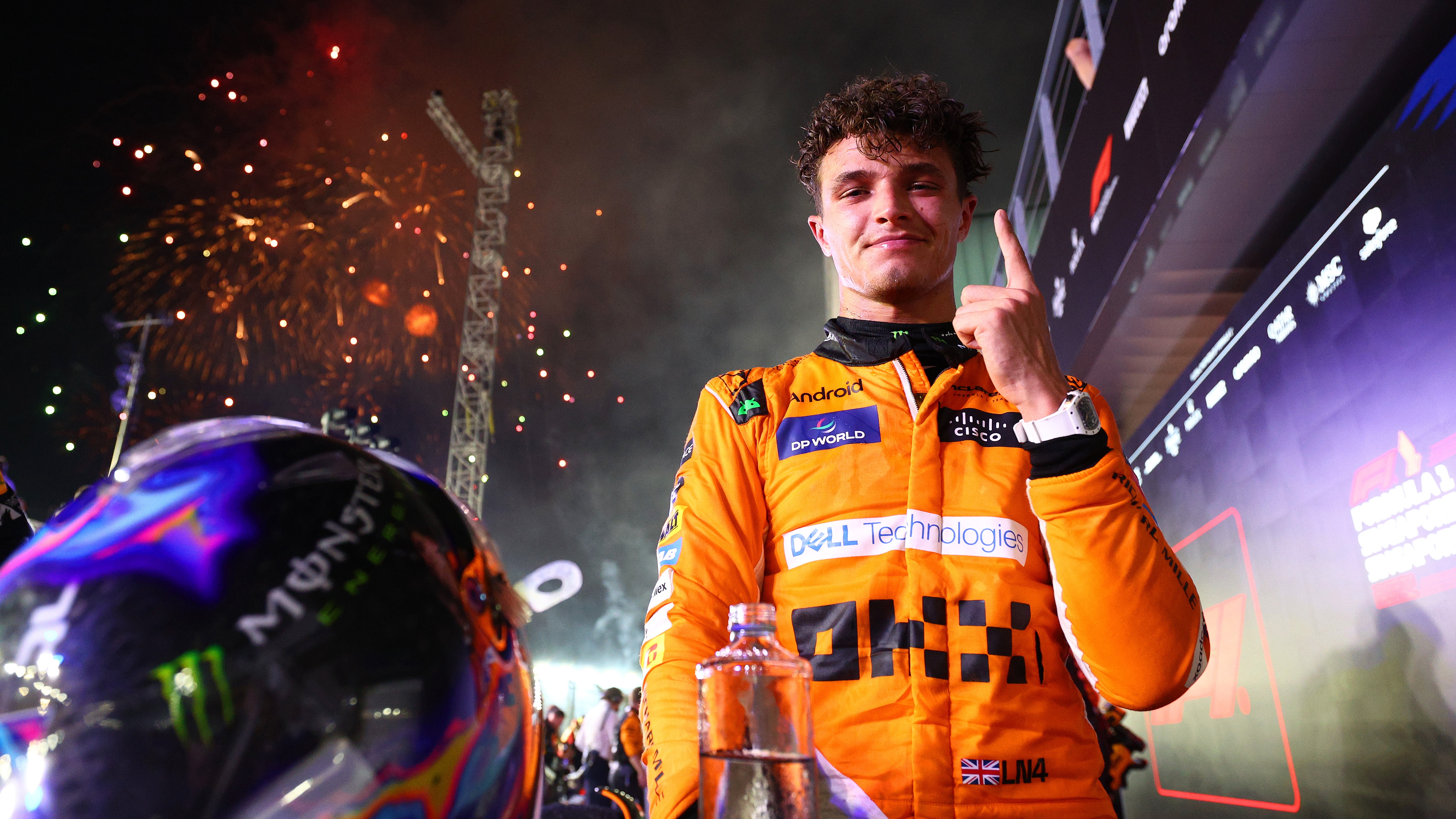  Race winner Lando Norris of Great Britain and McLaren celebrates in parc ferme during the F1 Grand Prix of Singapore at Marina Bay Street Circuit on September 22, 2024 in Singapore, Singapore. 
